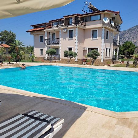 Oasis Apart Hotel Далян Екстериор снимка