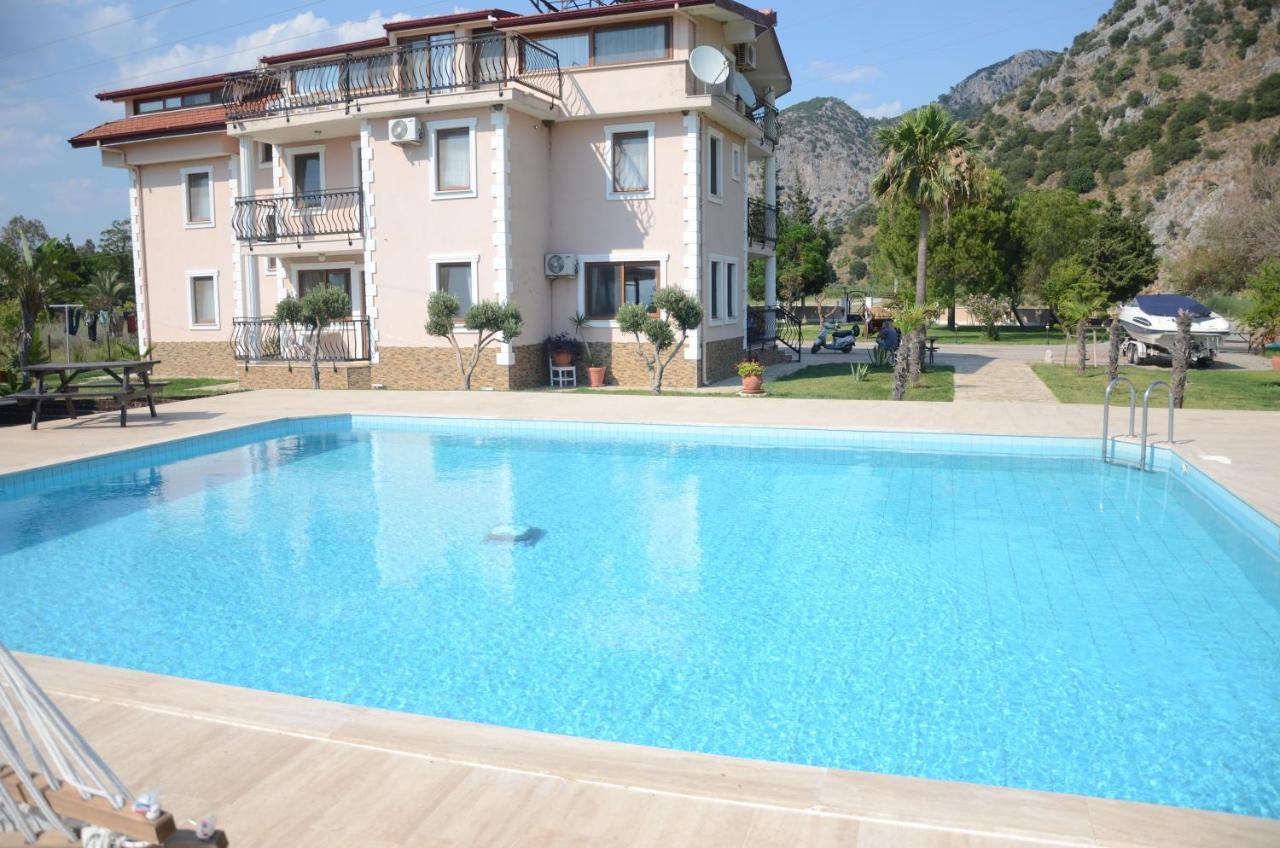 Oasis Apart Hotel Далян Екстериор снимка