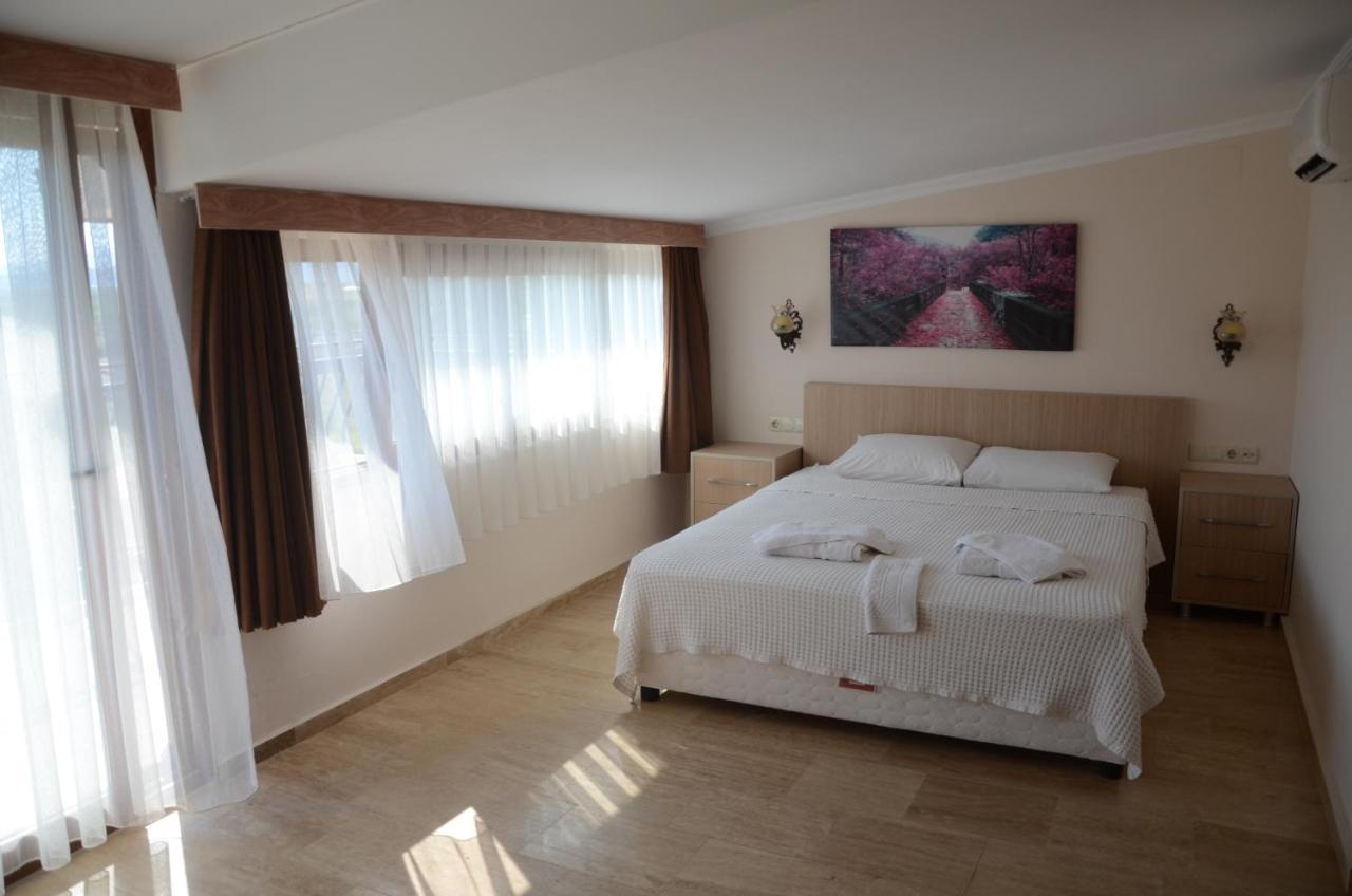 Oasis Apart Hotel Далян Екстериор снимка