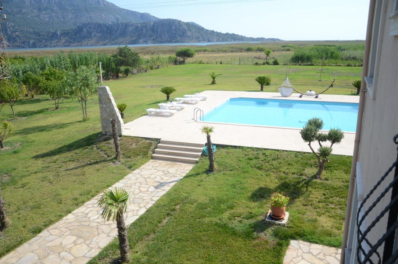 Oasis Apart Hotel Далян Екстериор снимка