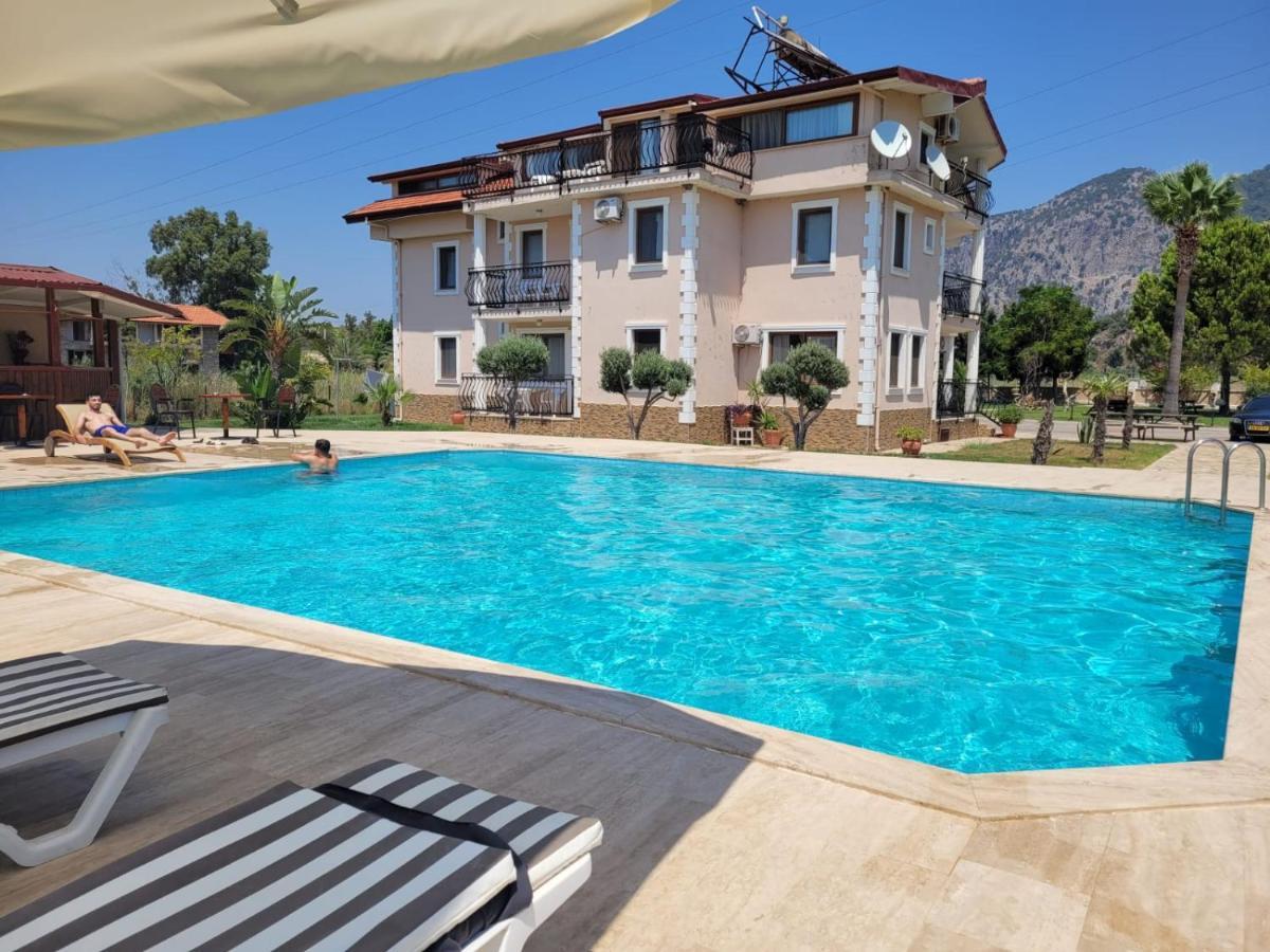 Oasis Apart Hotel Далян Екстериор снимка