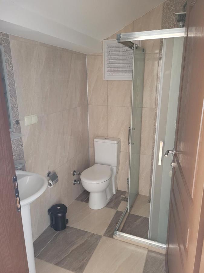 Oasis Apart Hotel Далян Екстериор снимка